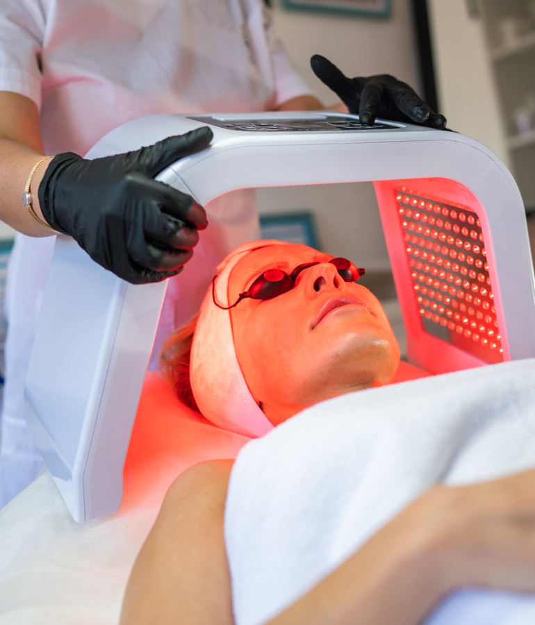 Woman under red light laser | La Jolla Cosmetic Laser Clinic In San Diego