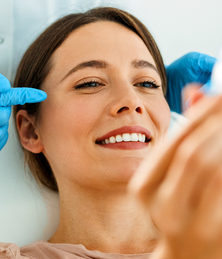 Smiling woman with dermatologist | La Jolla Cosmetic Laser Clinic In San Diego
