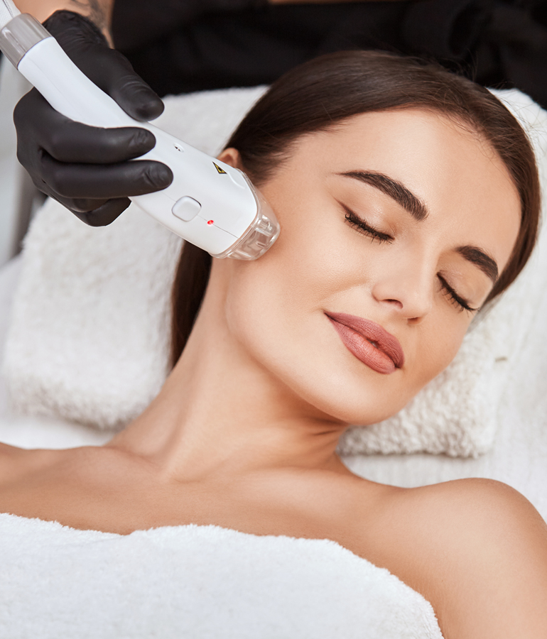 Relaxed woman getting laser treatment | La Jolla Cosmetic Laser Clinic In San Diego